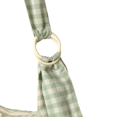 green and off white thread slouchy shoulder bag on a white background