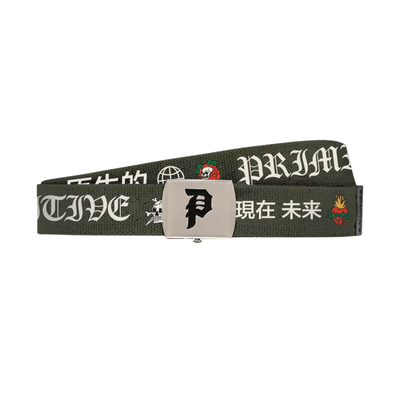 A dark olive green primitive brand woven belt with a silver metal buckle, featuring white gothic-style text and Japanese characters, along with small graphic motifs.