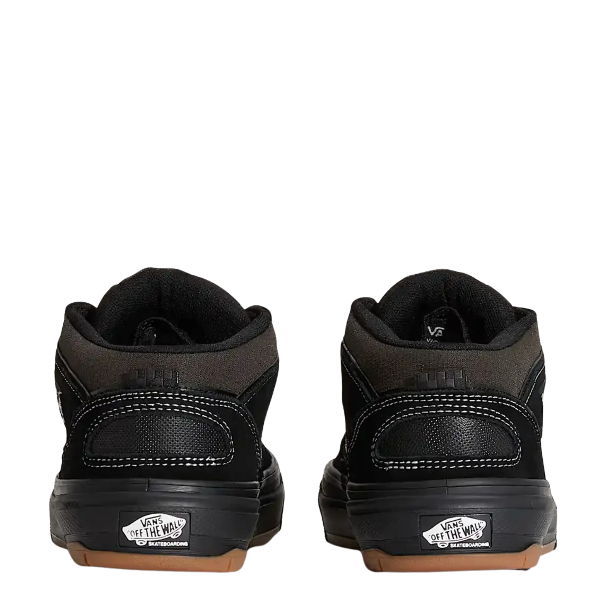 Black  vans united by skateboarding half cab mid-top sneaker with white laces on a white background