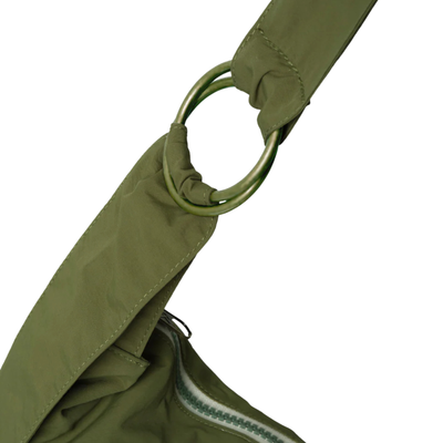 Green thread slouchy shoulder bag on a white background