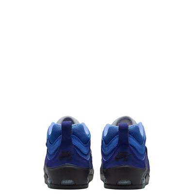 A Nike sb ishod wair Air Max sneaker in a vibrant royal blue colorway, featuring a black Swoosh logo, black laces, and a black midsole, shown from a side profile on a white background.