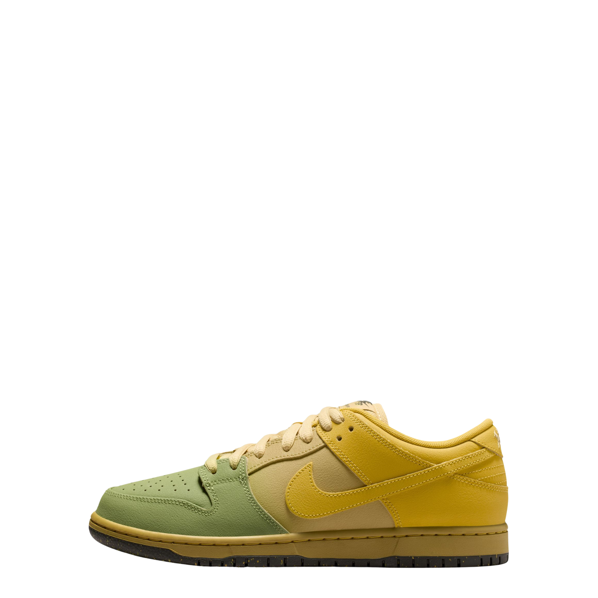 A Nike SB Saffron Dunk Low sneaker in a yellow, tan, and sage green colorway, shown from a side profile view against a plain white background.