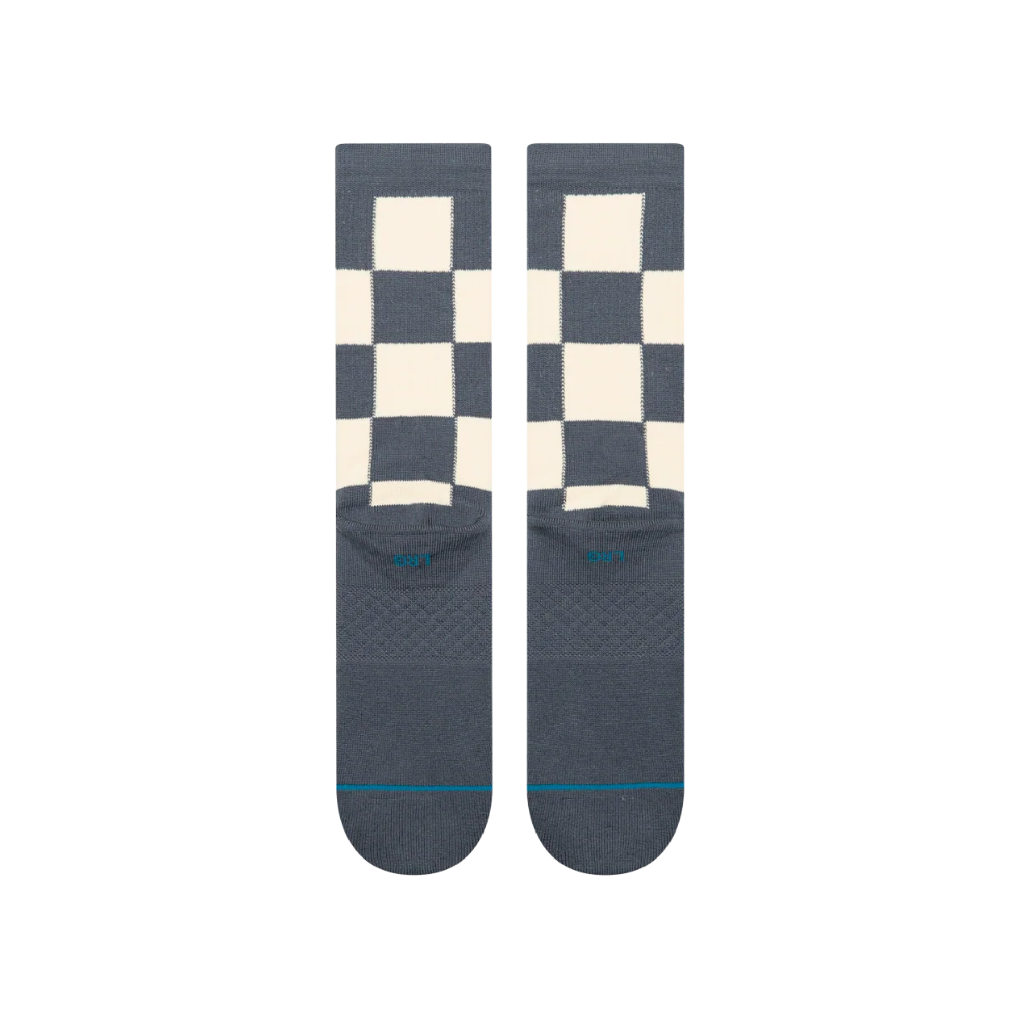 A pair of stance chaturanga crew socks with a blue-gray and cream checkerboard pattern, featuring a small circular Stance logo on the side and a thin teal stripe on the toes.