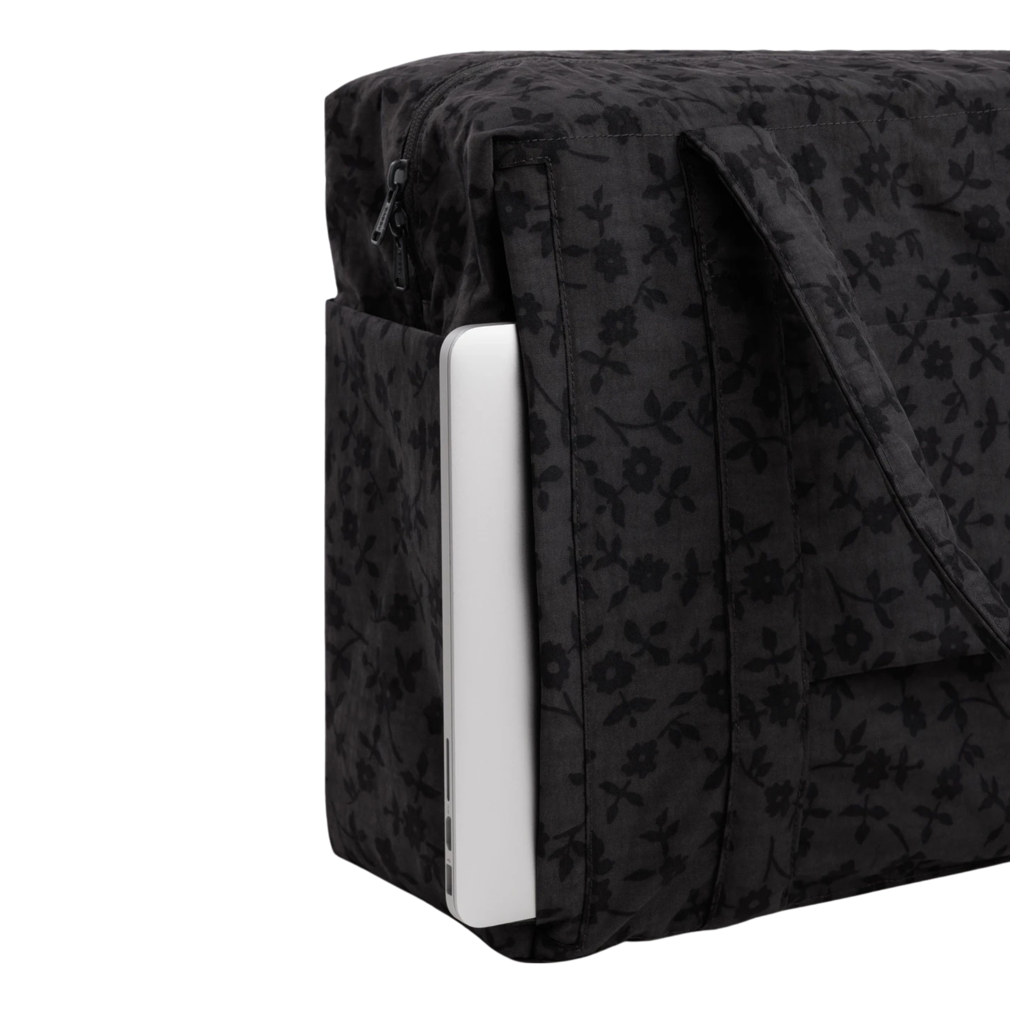 A black baggu cloud carry-on tote bag with a subtle tonal floral pattern, featuring two top handles and side pockets, shown against a plain white background.