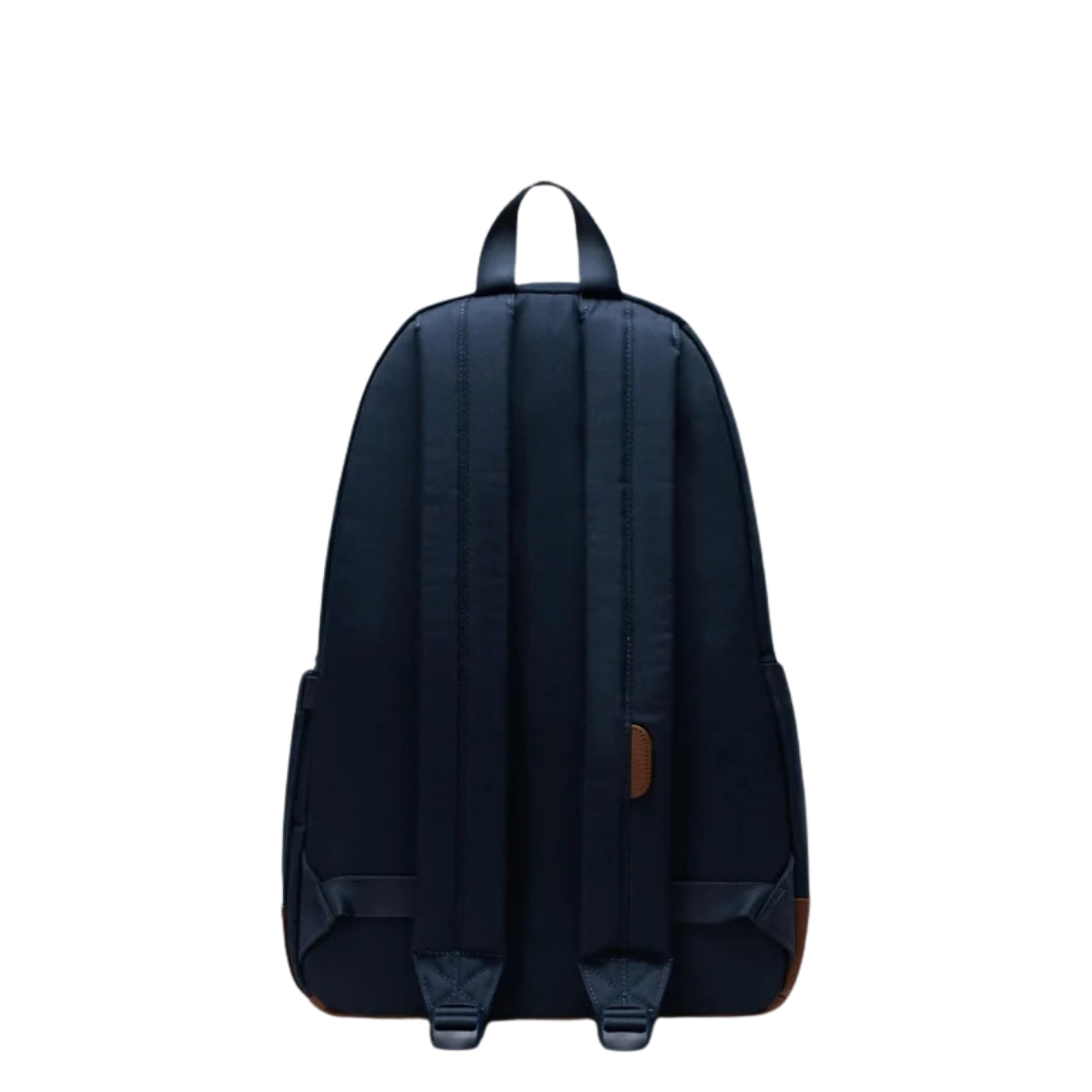 back of a Navy herschel heritage backpack with tan leather bottom and details on a white background