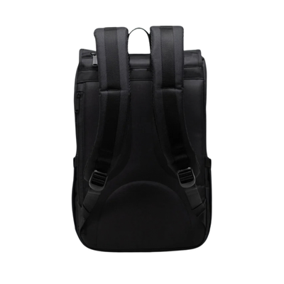 back of a black herschel little america backpack with tan straps on a white background