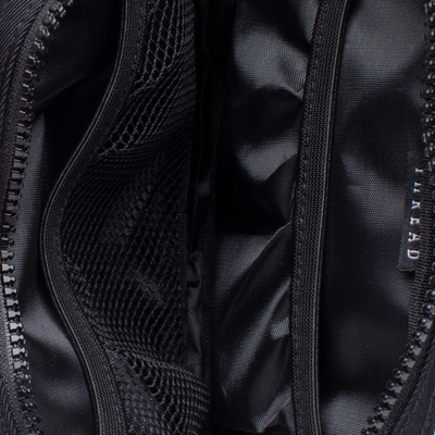 Black thread belt bag with a visible brand logo on a white background