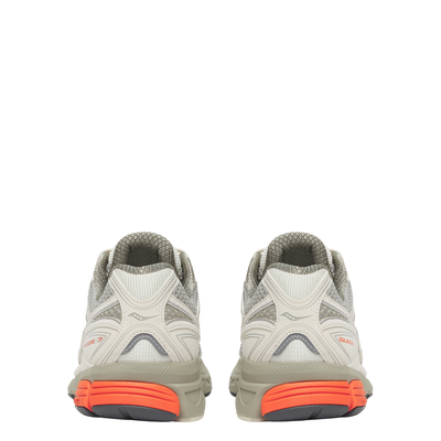 Gray tan saucony progrid guide 7 running shoe with orange sole on a white background