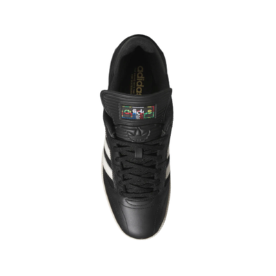 black leather adidas busenitz skateboard sneaker with an off white sole on a white background