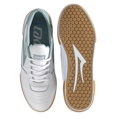 White lakai cambridge elite sneaker with light blue accents and brown sole on a white background