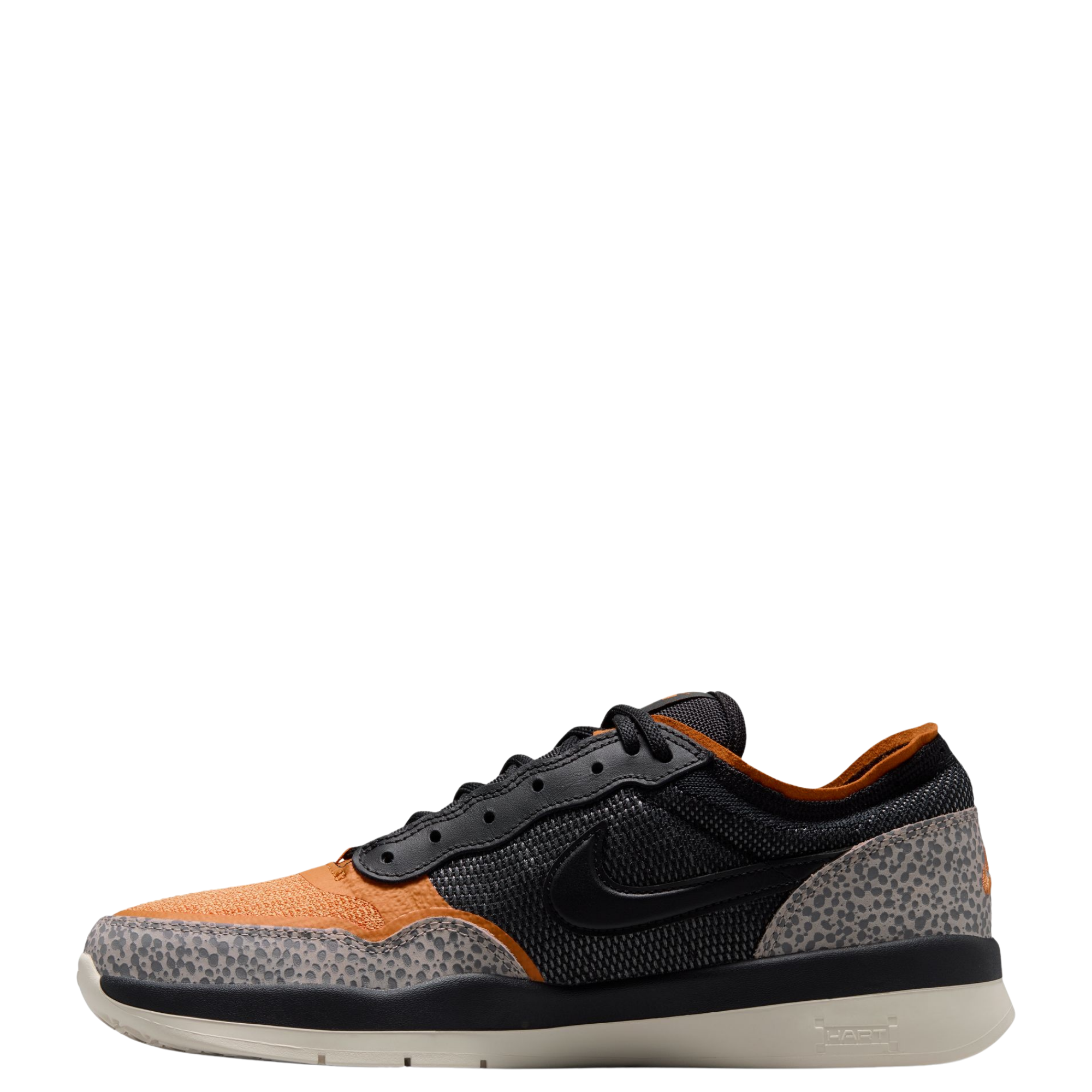 A Nike SB PS8 skateboard sneaker in black, orange, and gray leopard print, featuring a textured black mesh upper, a gray and black speckled pattern on the toe and heel, and a black Swoosh on the side. The shoe has a black laces, orange lining, and a light beige midsole.
