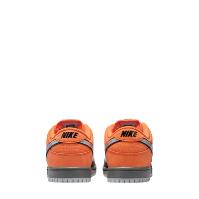 Orange and brown nike sb dunk low pro muni fast pass sneaker with a colorful swoosh logo on a white background