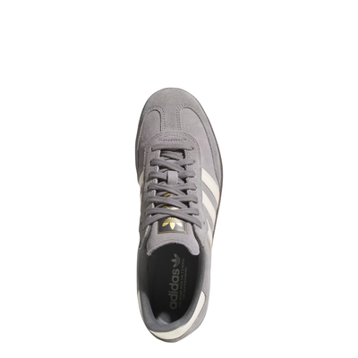 Gray Adidas samba adv skateboard sneaker with white stripes on a white background