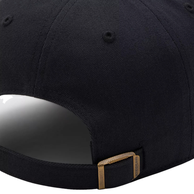 Black new balance numeric clean up hat with a logo on a white background