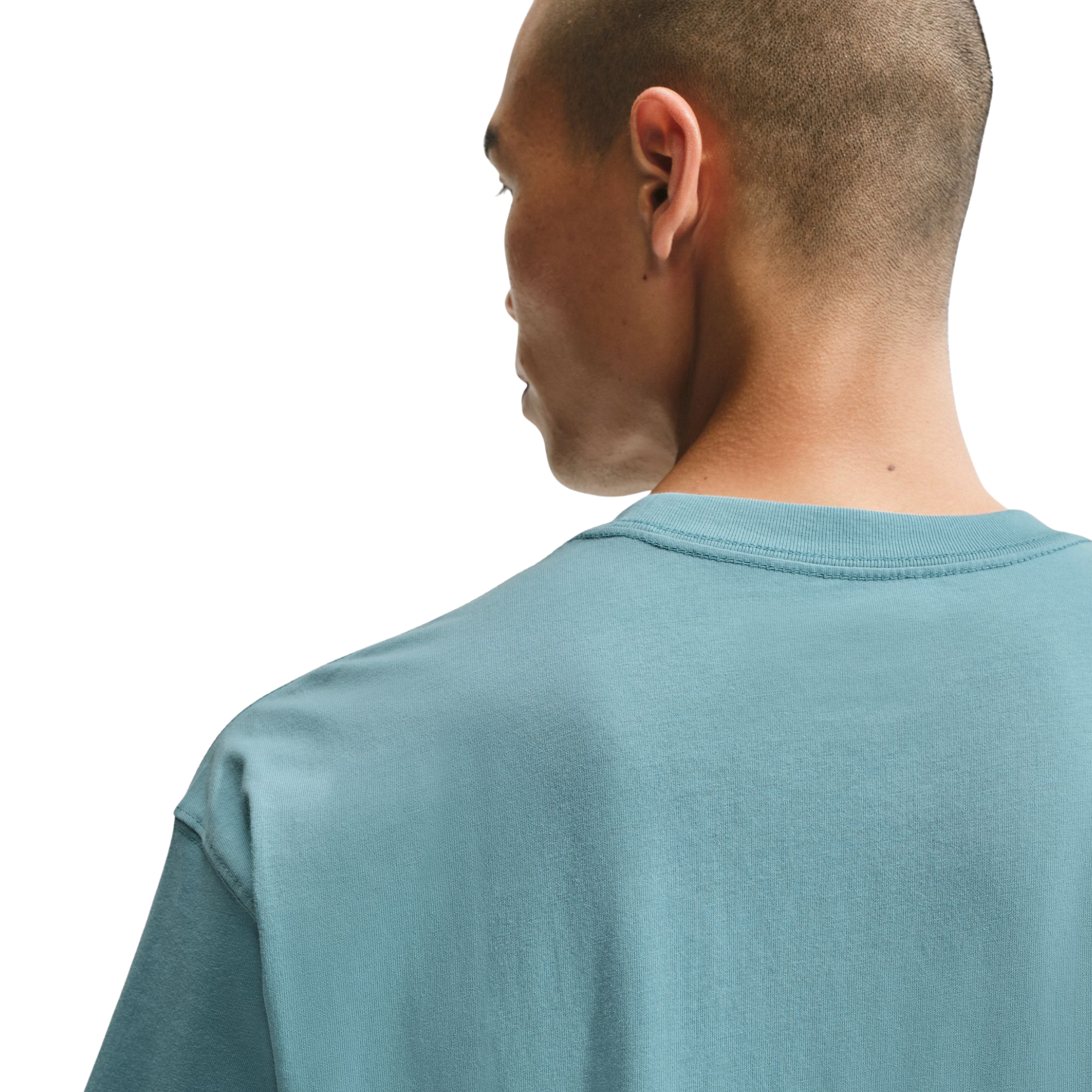 Man wearing a light blue t-shirt with a Nike logo on a white background