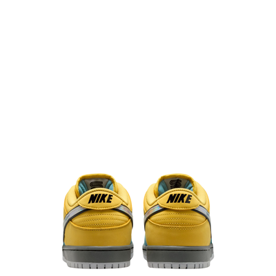 Yellow and teal NIKE SB MUNI FAST PASS sneaker with a visible Nike logo on a white background