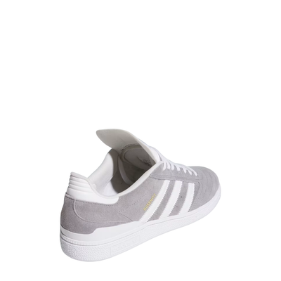 Gray Adidas busenitz skateboard sneaker with white stripes on a white background