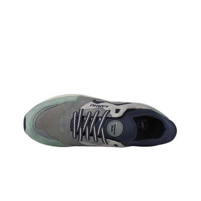Gray and green karhu aria 95 legends sneaker with 'Karhu' branding on a white background