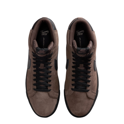 Brown mid-top nike sb blazer sneaker with black swoosh logo on a white background