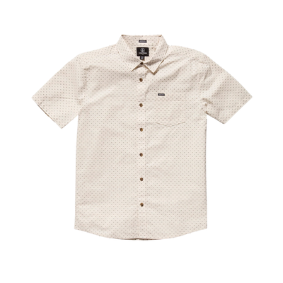 Man wearing a beige patterned volcom bankstone ii shirt on a white background