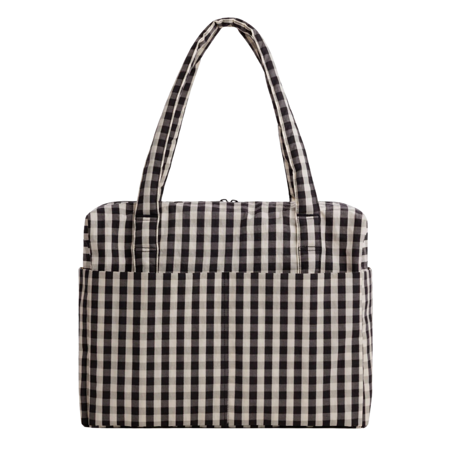 A black and white gingham checkered baggu cloud carry on tote bag with two shoulder straps, shown against a plain white background.