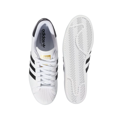 White Adidas Superstar sneaker with black stripes on a white background