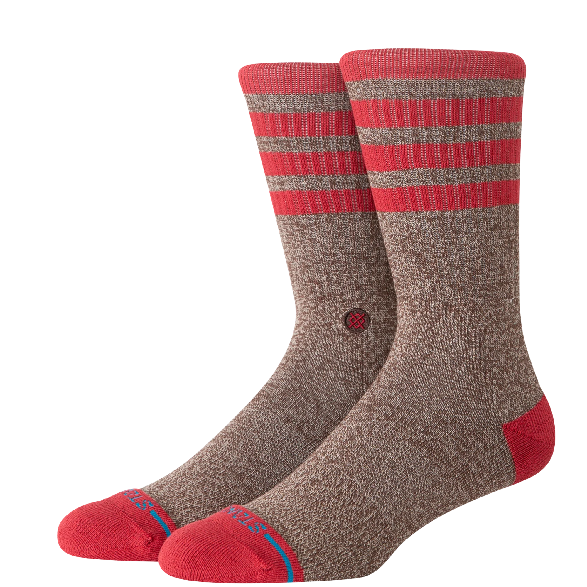 A pair of stance sock monkey crew socks in heathered brown with bright red stripes at the ribbed cuffs, red heels, and red toes, featuring a small red circular logo on the side.