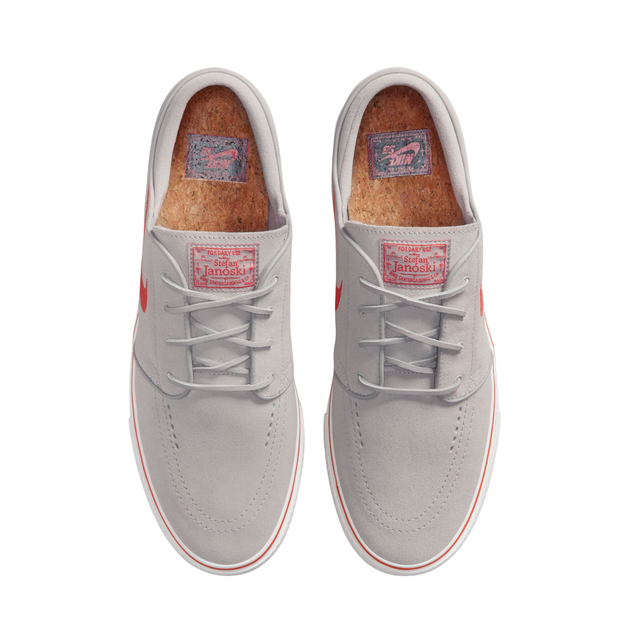 Gray NIKE sb men's janoski OG+ sneaker with an orange swoosh logo on a white background