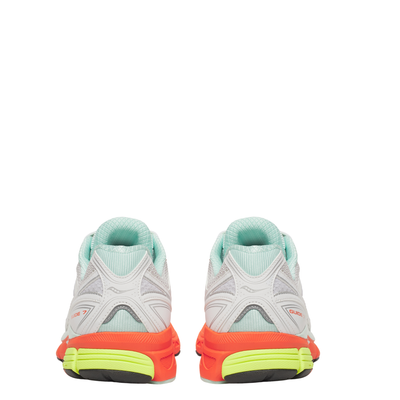 White  saucony progrid guide 7 running shoe with colorful sole on a white background