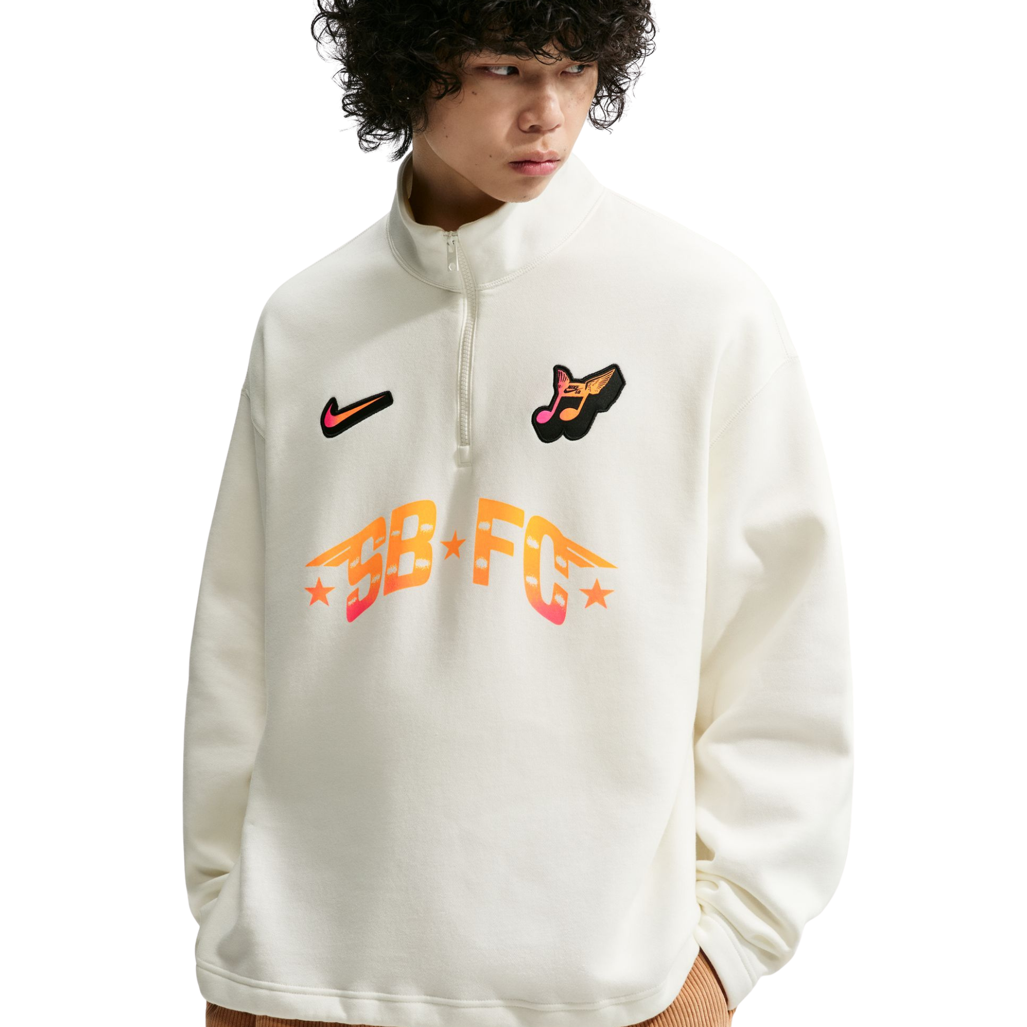 person wearing white half-zip NIKE SB FC PACKsweatshirts with logos and text on a white background