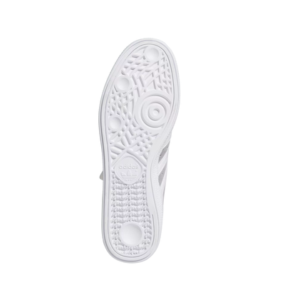 Gray Adidas busenitz skateboard sneaker with white stripes on a white background