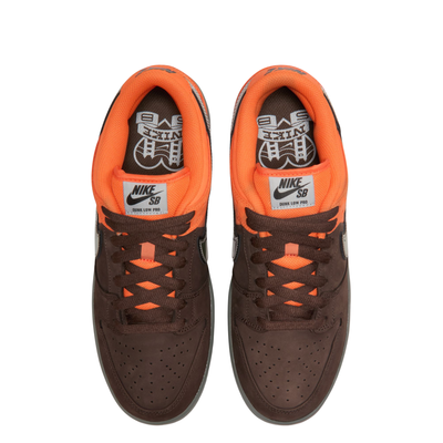 Orange and brown nike sb dunk low pro muni fast pass sneaker with a colorful swoosh logo on a white background