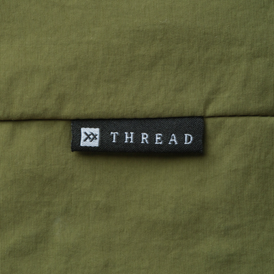 Green Thread slouchy shoulder bag on a white background