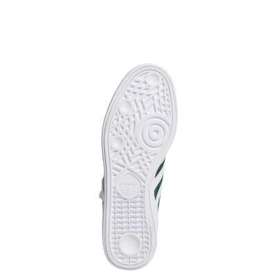 White sneaker sole with tread pattern on a white background