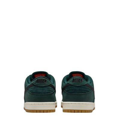 Green nike sb orange label dunk low sneaker with a black swoosh logo on a white background