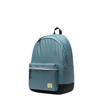 blue herschel classic xl backpack on a white background