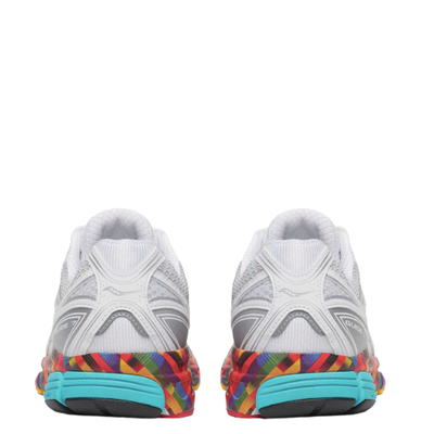 White saucony boston progrid guide 7 running shoe with colorful sole on a white background