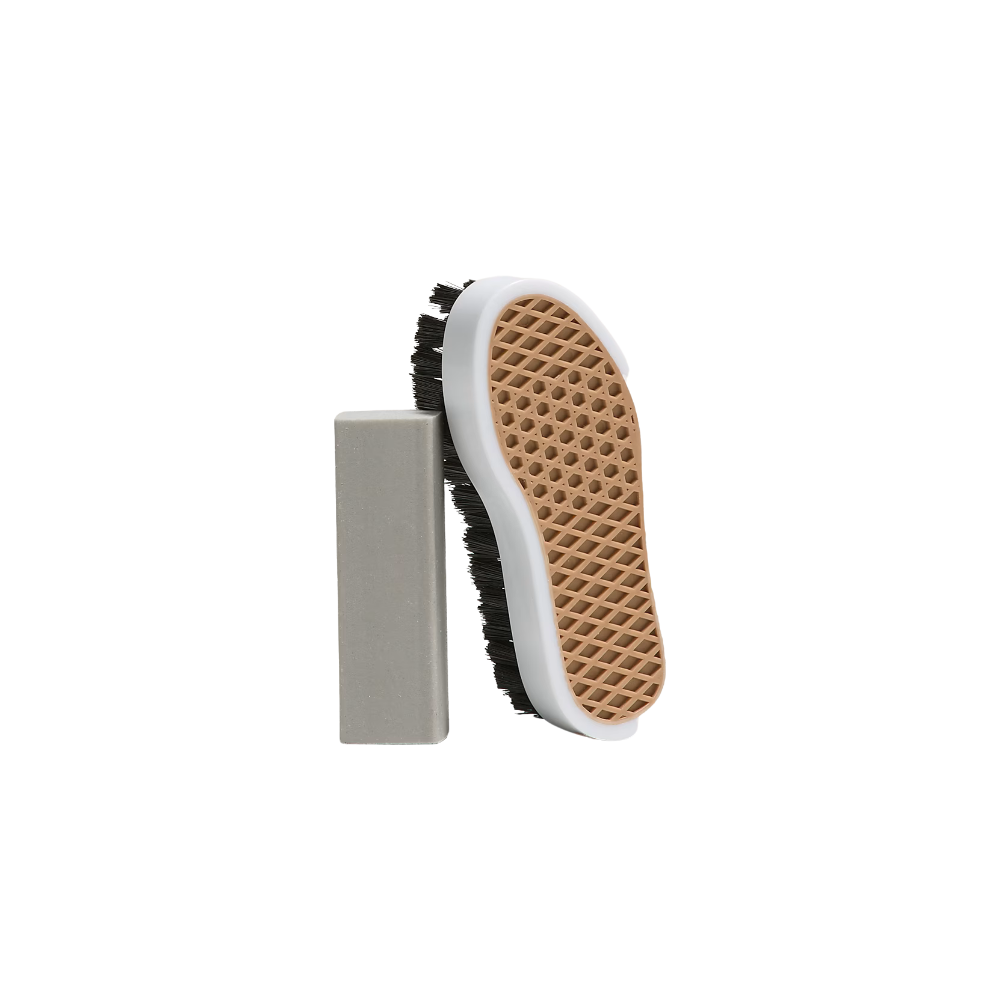 Shoe cleaning brush with a textured sole on a white background