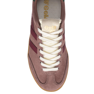 pink gola women's cyclon sneaker with blush pink suede upper, dark pink leather stripes and green leather detail in the back on a white background