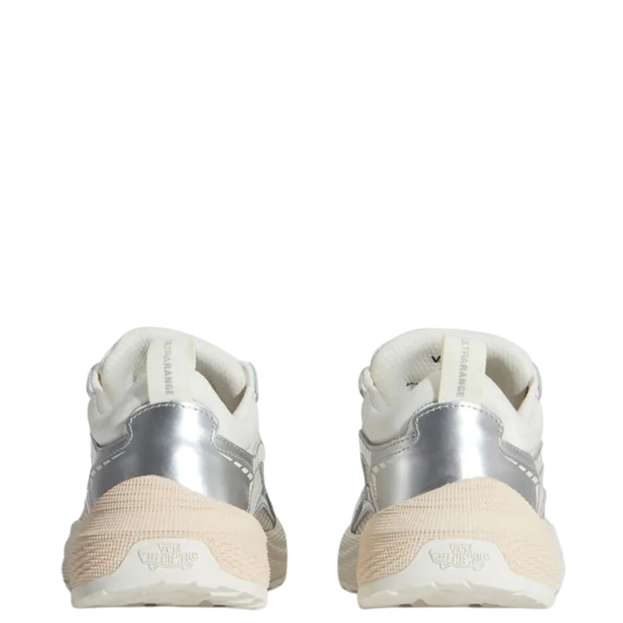 A pair of low-top vans ultrarange neo 2.0 sneaker shown in profile against a solid white background. The shoe features a cream-colored knit upper with metallic silver overlays, a chunky cream midsole, and white laces.