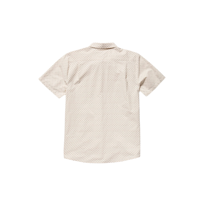 Man wearing a beige patterned volcom bankstone ii shirt on a white background