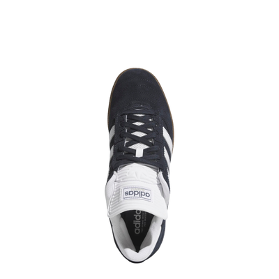 dark grey adidas busenitz skateboarding shoe with white strips and tongue and  gum sole on a white background