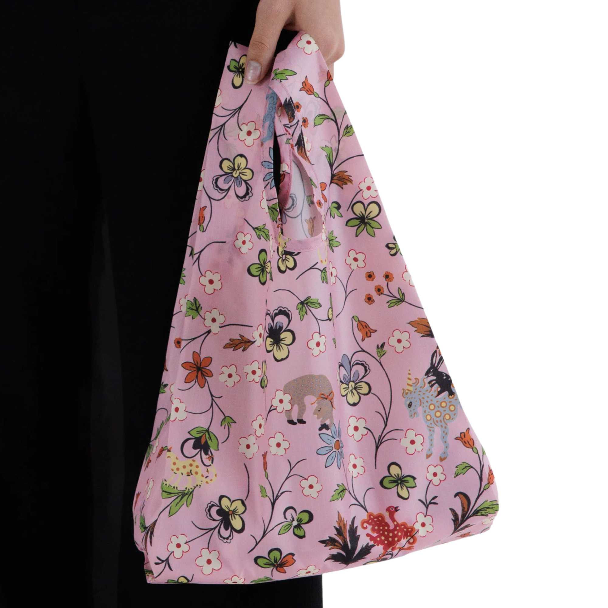 pink baby baggu reusable tote with a floral design being held in someone's hand on a white background