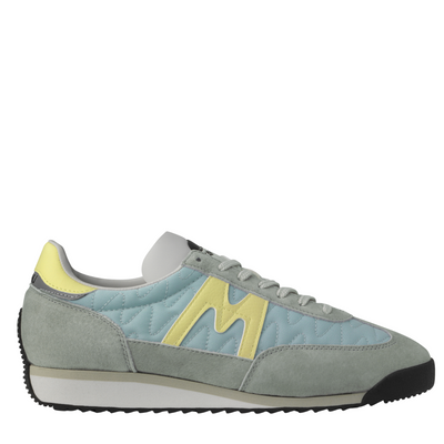 grey and blue karhu mestari Sneaker with a yellow 'M' logo on a white background