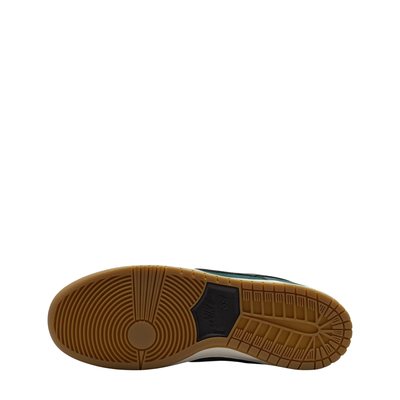 Close-up of a shoe sole with brown tread pattern on a white background