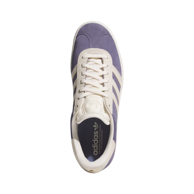 purple adidas gazelle adv skateboard shoe with white stripes on a white background