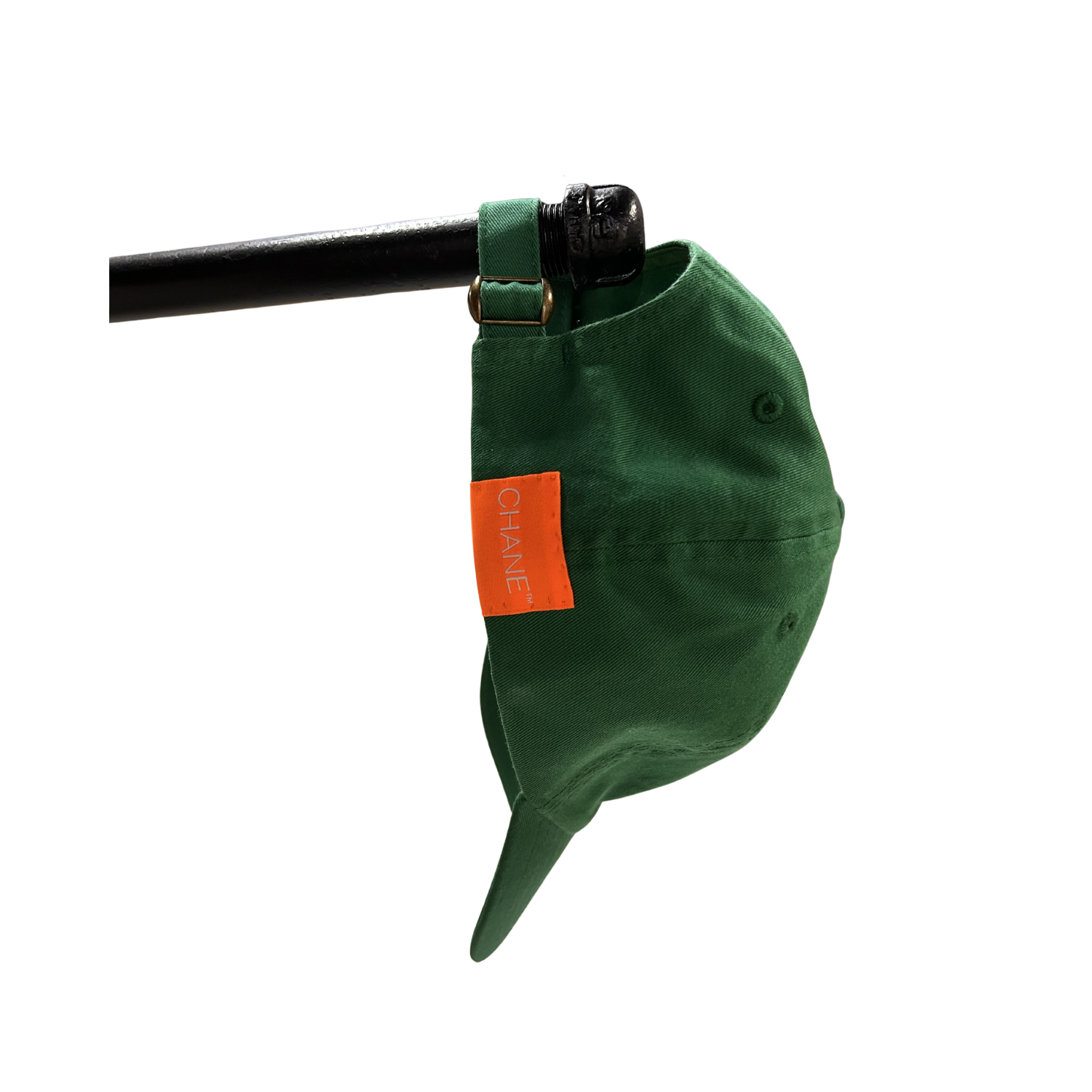 green cap with yellow  eat your f'n vegetables text on a white background