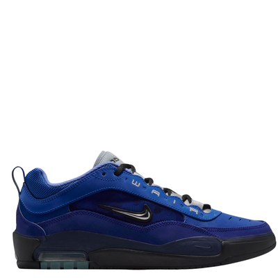 A Nike sb ishod wair Air Max sneaker in a vibrant royal blue colorway, featuring a black Swoosh logo, black laces, and a black midsole, shown from a side profile on a white background.