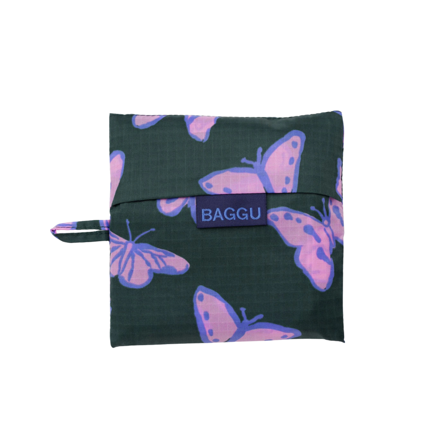 Reusable standard baggu bag with purple butterfly pattern on a green background