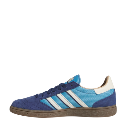 navy and bright blue adidas men's busenitz vintage skateboard shoes with white stripes and a gum sole on a white background